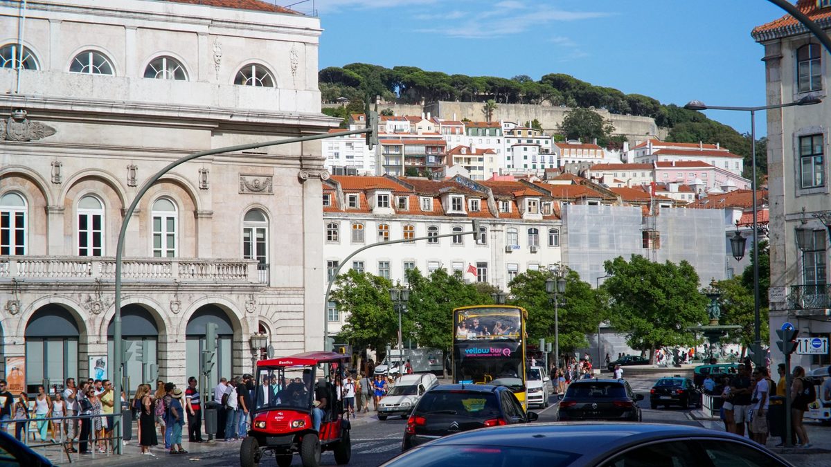 Rossio Square in Lisbon with Castelo de São Jorge on the hill behind